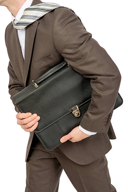 istock Businessman holding suitcase 503782956