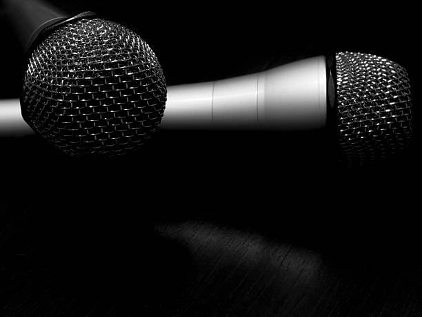 istock black and white two microphones concept 503783026