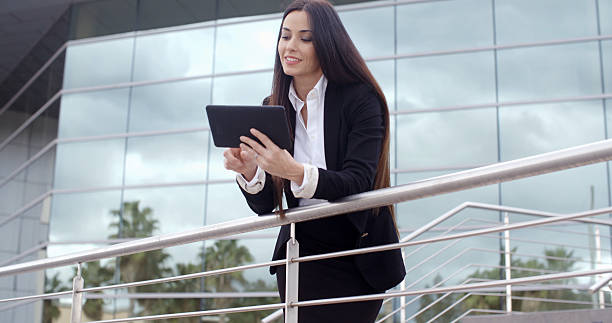 istock Young businesswoman browsing on her tablet 503783712