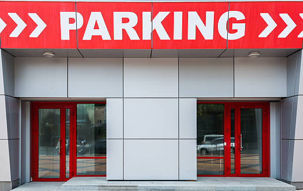 istock Parking entrance with a pointer of white letters 503784233