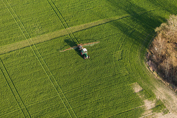 istock aerial view of harvest fields with tractor 503784372