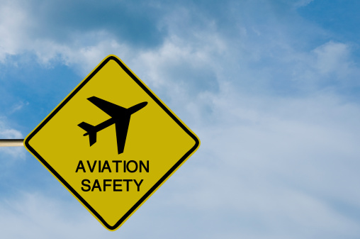 Sign with a picture of an aircraft and the words 