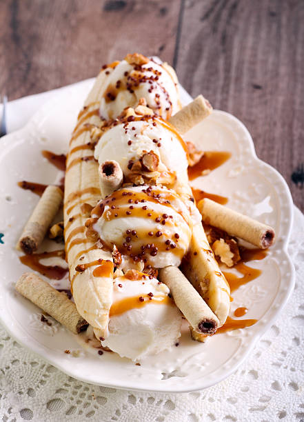 Traditional Banana Split with nuts and whipped cream