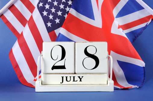 Vintage style white block calendar for 28 July, start of World War I, centenary, 1914 to 2014, with USA, stars and stripes, and UK, Union Jack, flag.