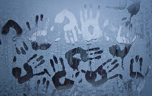 istock Handprints on a frozen window glass 503788168