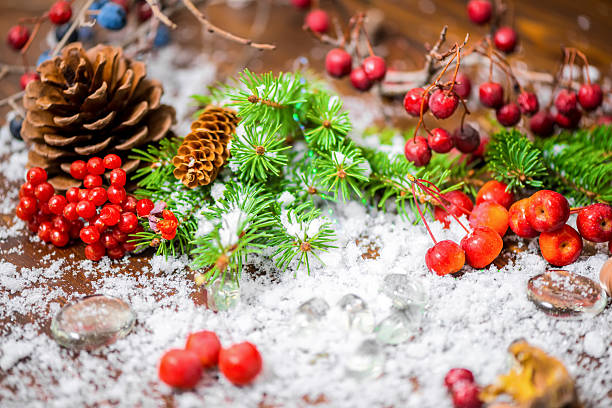 istock beautiful Christmas concept with cones, berries, fir tree 503789974