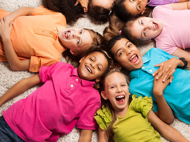 istock Kids laying in star shape 503790155