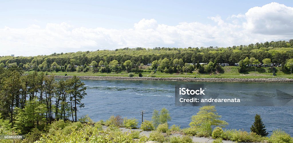 Cape Cod Canal The Cape Cod Canal is an artificial waterway in the state of Massachusetts connecting Cape Cod Bay in the north to Buzzards Bay in the south. Canal Stock Photo