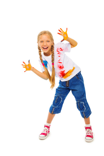 Nice little girl isolated on white shows painted palms