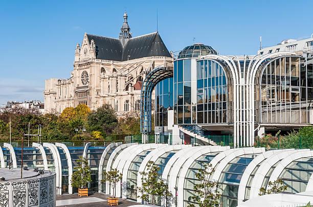 The Saint Eustache church seen from the commercial center LEs Halles in Paris, France