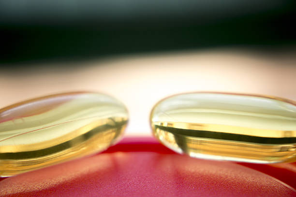 istock Cod liver fish oil omega 3 6 9 capsules 503804902