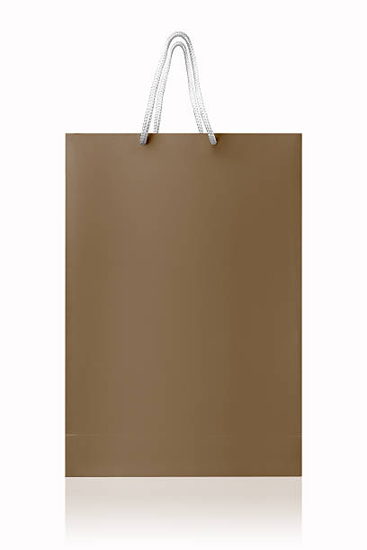 istock Brown recycled shopping bag, isolated with clipping path on white 503806185