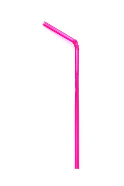 istock Pink straws on the white background 503806301