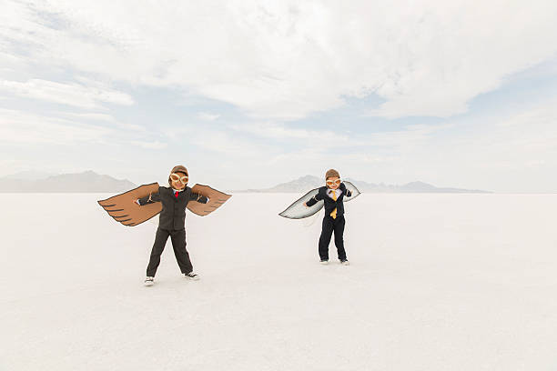 istock Young Business Boys Wearing Cardboard Wings 503806800