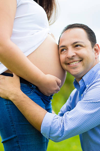 istock Happy father listening her baby 503807843
