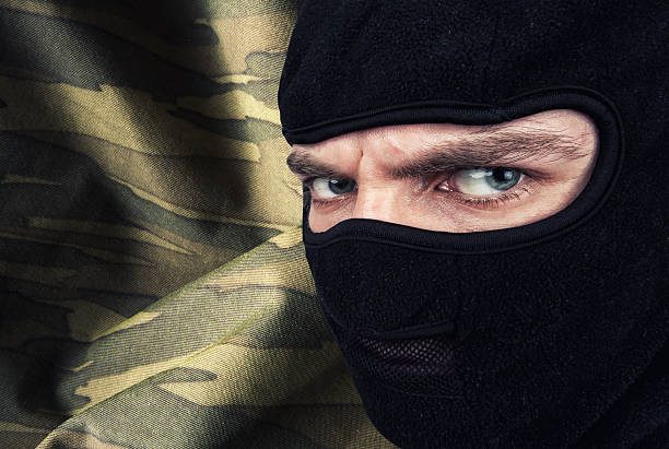 istock Serious man in a balaclava mask 503808593