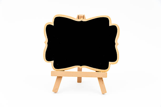 istock Wooden easel mini blackboard isolated on white 503808972