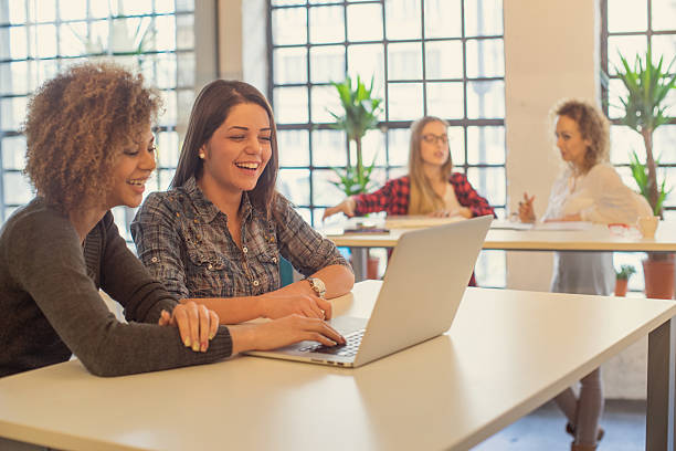 istock young women at the office 503810910