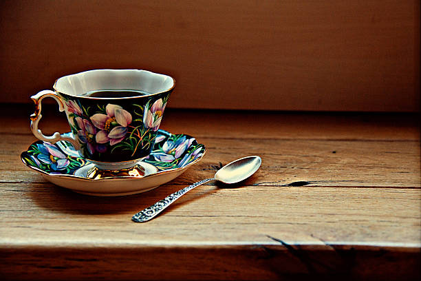 close up woman drinking hot tea