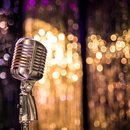 Old style concert microphone on the nightclub stage