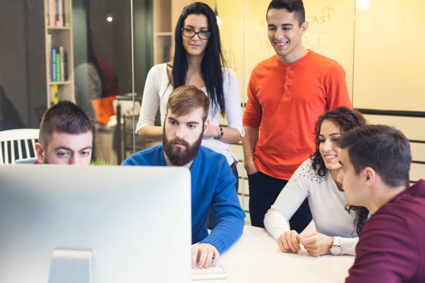 istock Six office colleagues in a casual team meeting 503815064
