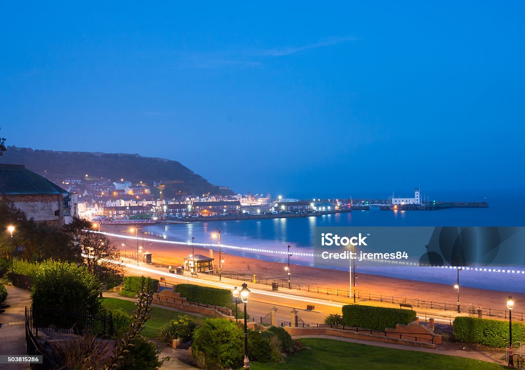 Scarborough South Sands Scarborough South Sands in the evening during blue hour. Scarborough, North Yorkshire, United Kingdom Beach Stock Photo