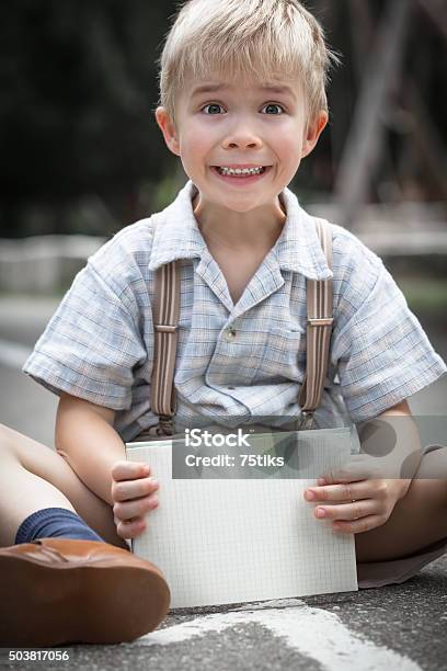 Retro School Boy And Notebook Stock Photo - Download Image Now - 2015, Anticipation, Arts Culture and Entertainment