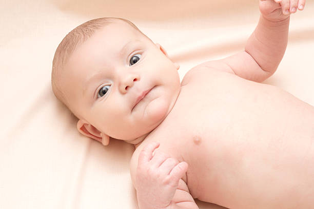 istock 2 months baby smiling at the camera 503817160