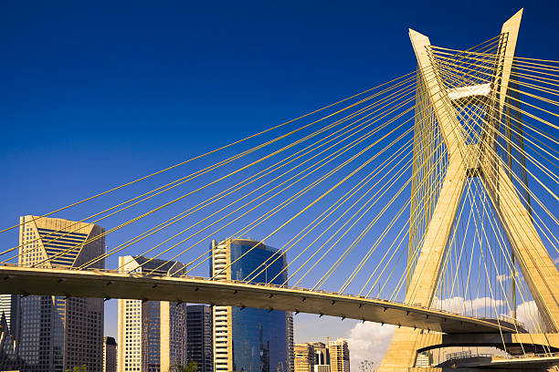 Famous cable-stayed bridge at Sao Paulo city. Photo of the famous cable-stayed bridge located at Sao Paulo city. The name of this bridge is "Octavio Frias de Oliveira ". This is a famous image of the most important  city of Brazil. The bridge is over Pinheiros River and Marginal Pinheiros. cable stayed bridge stock pictures, royalty-free photos & images