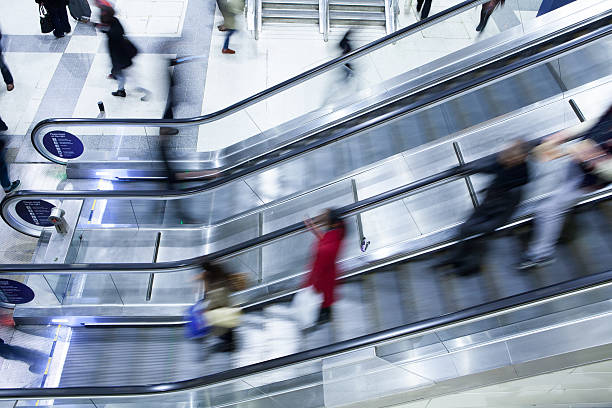 istock Blur Movement people escalator in Rush Hour train station, London 503833539