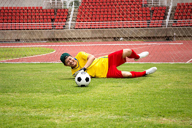 istock Goalkeeper catches the soccer ball 503833765