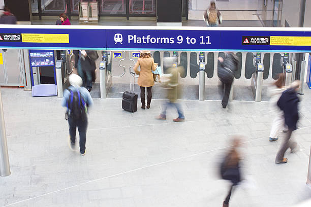 istock Blur Movement people in Rush Hour train station, London, UK 503837097