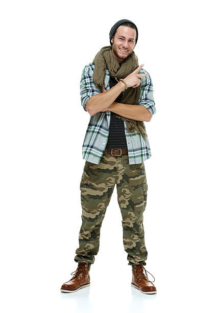 istock Smiling hipster showing victory sign 503837224