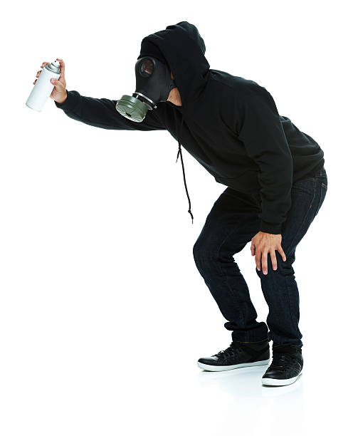 istock Graffiti artist in action with aerosol can 503843402