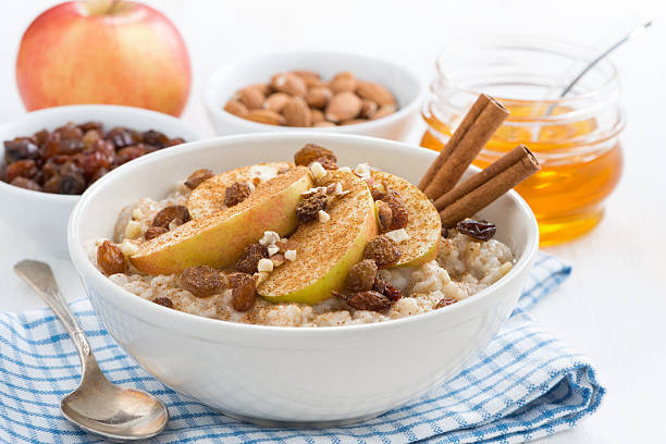 istock oatmeal with apples, raisins and cinnamon for breakfast 503845050