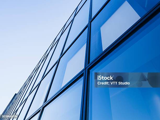Architecture Detail Modern Glass Facade Blue Tone Stock Photo - Download Image Now - Window, Building Exterior, Glass - Material