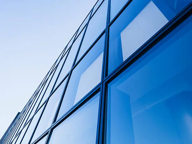 Photo of Architecture detail Modern Glass facade Blue tone