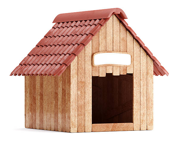 Wooden doghouse isolated on white background stock photo