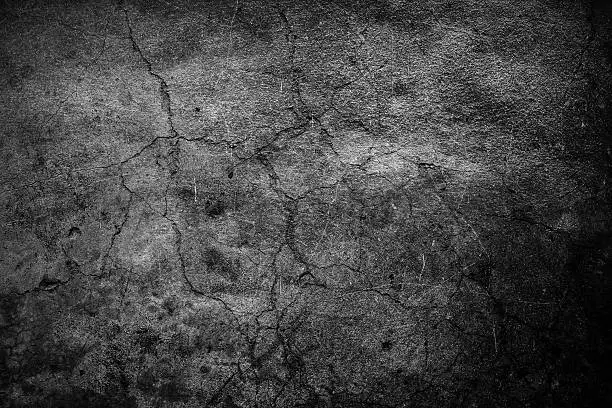 Photo of Cracked cement background