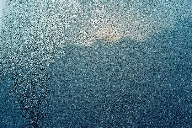 istock fantastic abstract pattern frozen water on a glass 503848208