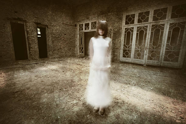 istock Ghost white girl in ruined house 503848656