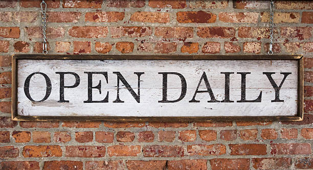 istock Wooden sign with text open daily 503864548