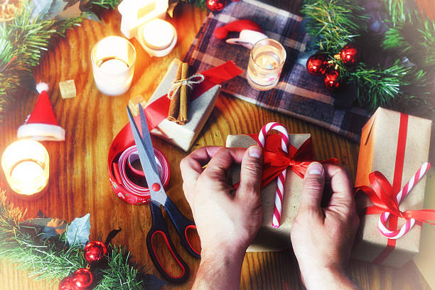 istock gift packaging hand christmas wood 503864760