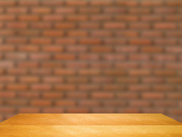 istock Wood floor on blur brick wall  background. 503866548