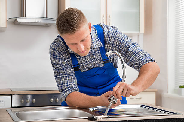 istock Repairman Installing Faucet Of Kitchen Sink 503866714