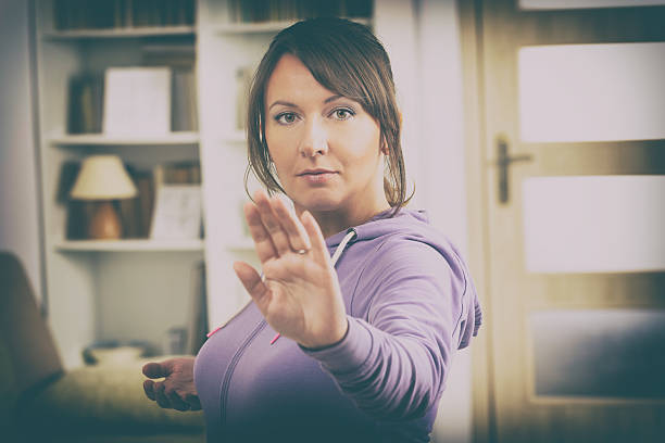 istock Woman doing qi gong tai chi exercise 503870198
