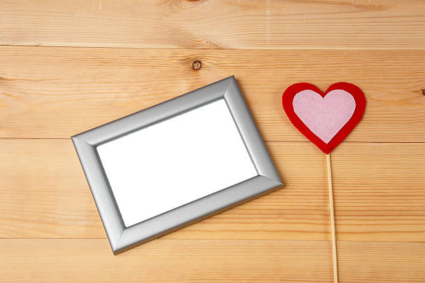 istock Valentines day heart and blank photo frames 503872432