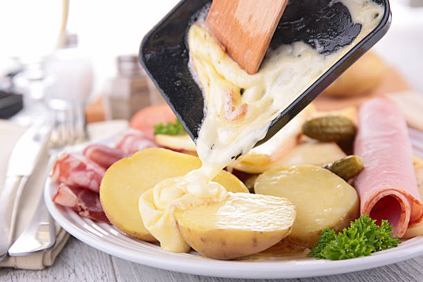 раклетт сыр - raclette cheese стоковые фото и изображения