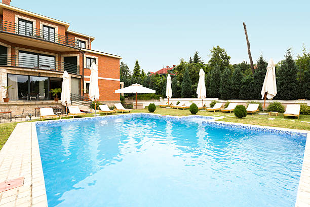 istock Private pool in front of a holiday resort 503872898