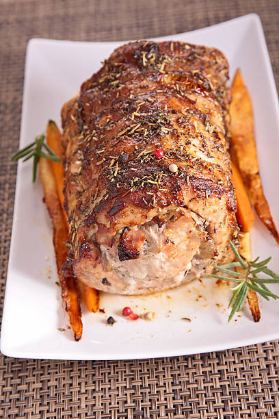 istock roast meat with herb and carrot 503872994